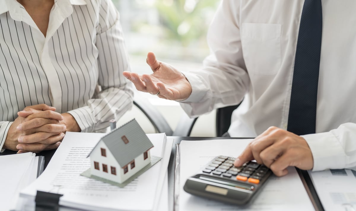Business people signing contract making deal with real estate agent